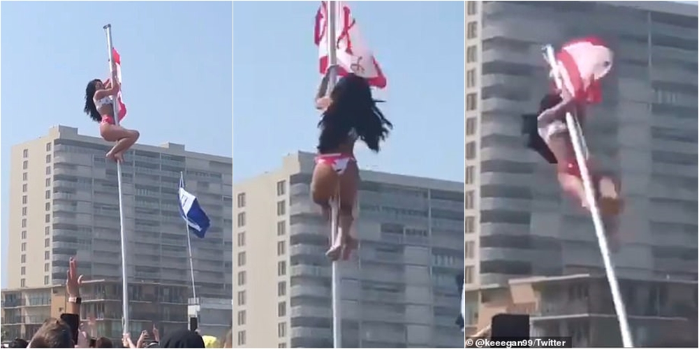 Po ngjitej të kapte flamurin ndërkohë që turma brohoriste, e pëson keq studentja me bikini