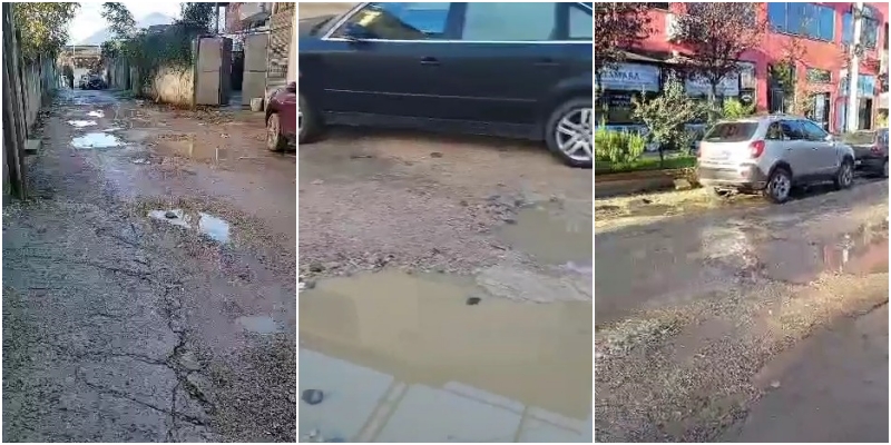 Rrugët e Tiranës mbushen plot me gropa e pellgje uji, këmbësorët dhe makinat mezi kalojnë