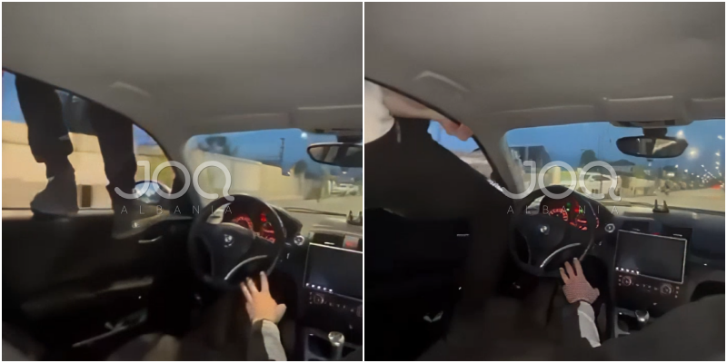 Shoferi i lë timonin pasagjerit dhe del në dritare për të bërë video