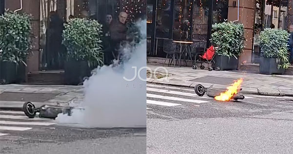 Merr flakë skuteri në Tiranë  burrat nga kafja shikojnë se si digjet